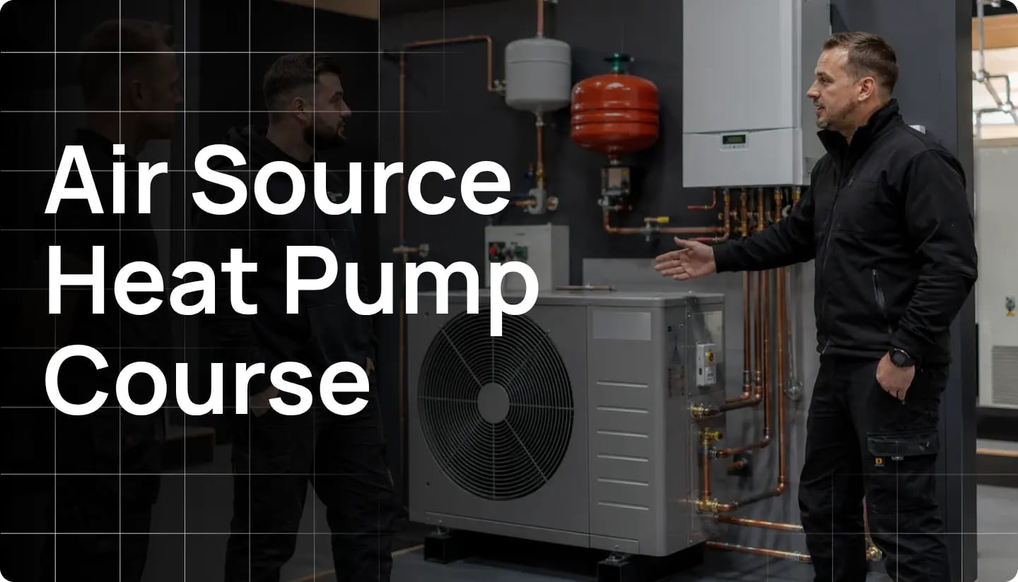 Engineer receiving hands-on air source heat pump training on a working unit with Hurak